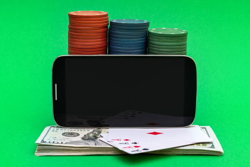 Mobile Poker with poker chips, cards, and money